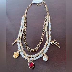 Francesca's Collections Gold and White Multi-Charm Necklace